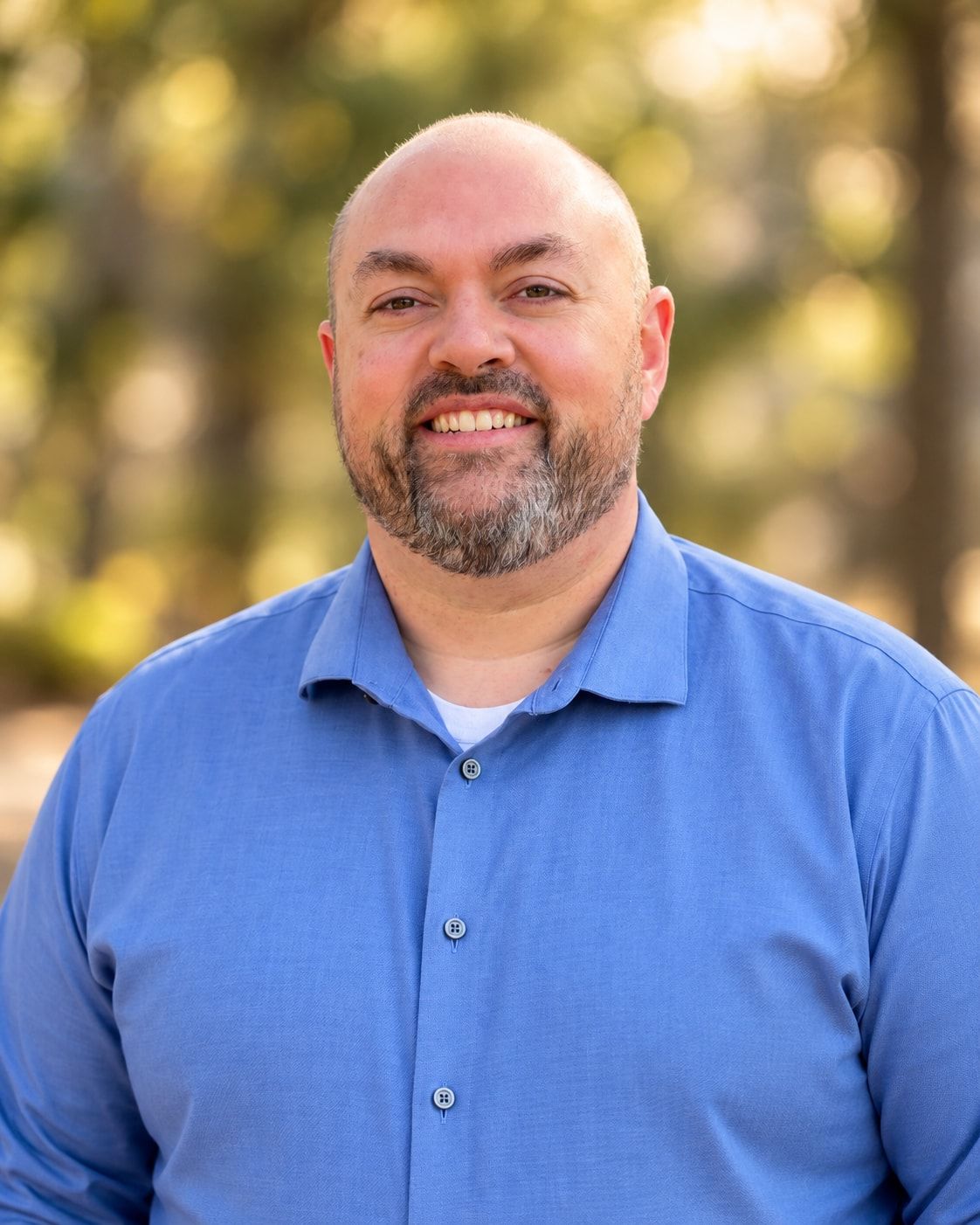 Joshua (Josh) Christensen, founder of Pixlode, smiling outdoors